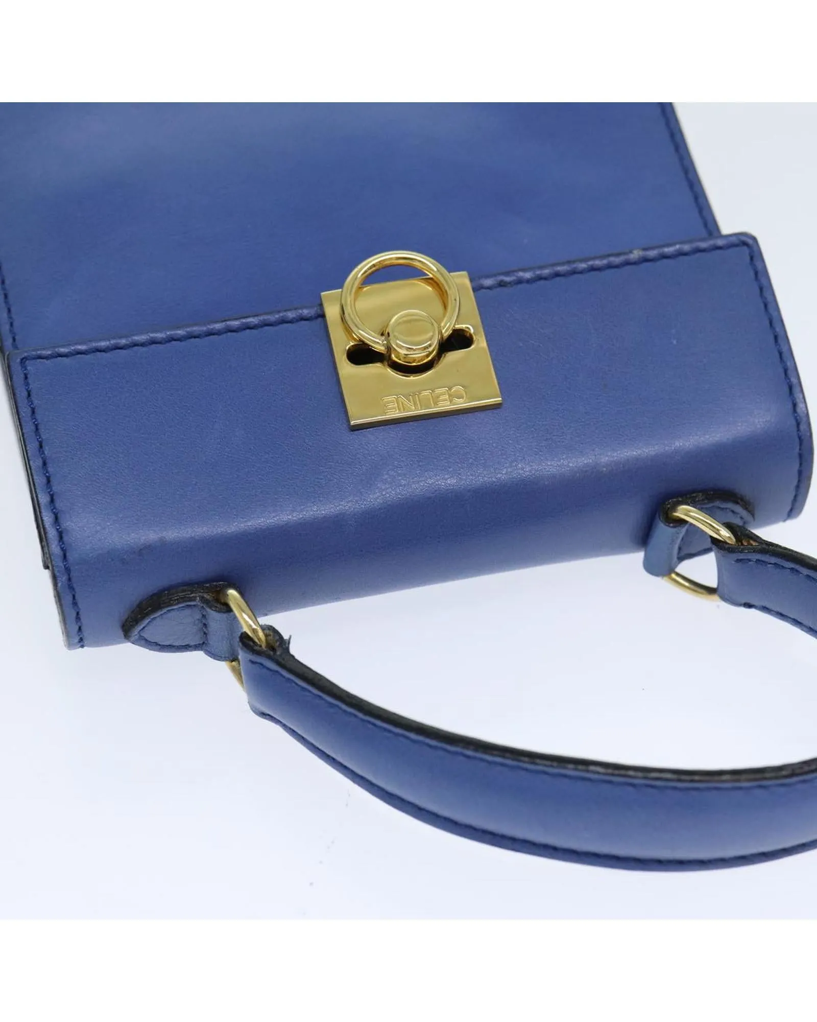 Leather Handbag with Handle and Metal Accents